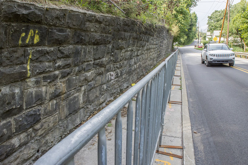 Crumbling retaining wall is Sharon's responsibility